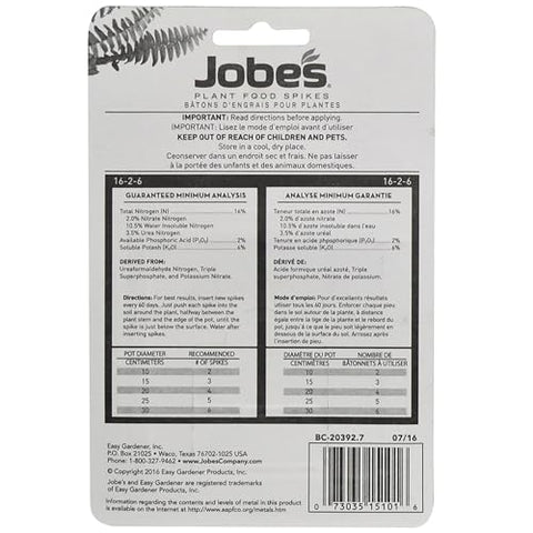 Jobe's spikes in soil around roots for steady plant nutrition.