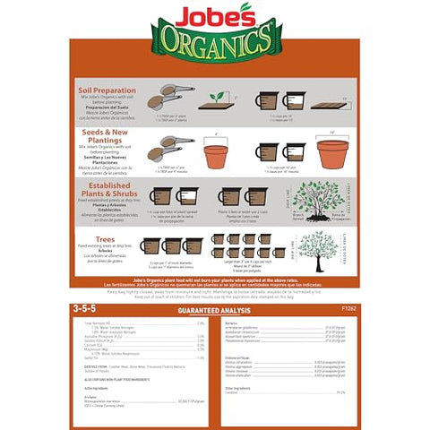 Jobe’s Organics granules being applied to a citrus tree.