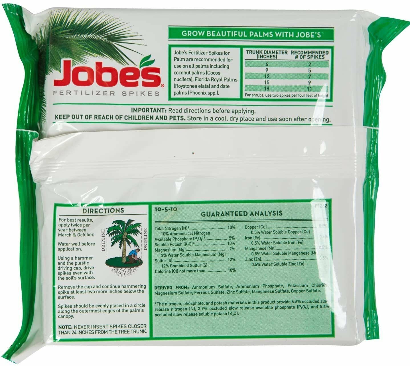 Inserting Jobe's Organics palm spikes around dripline for targeted feeding