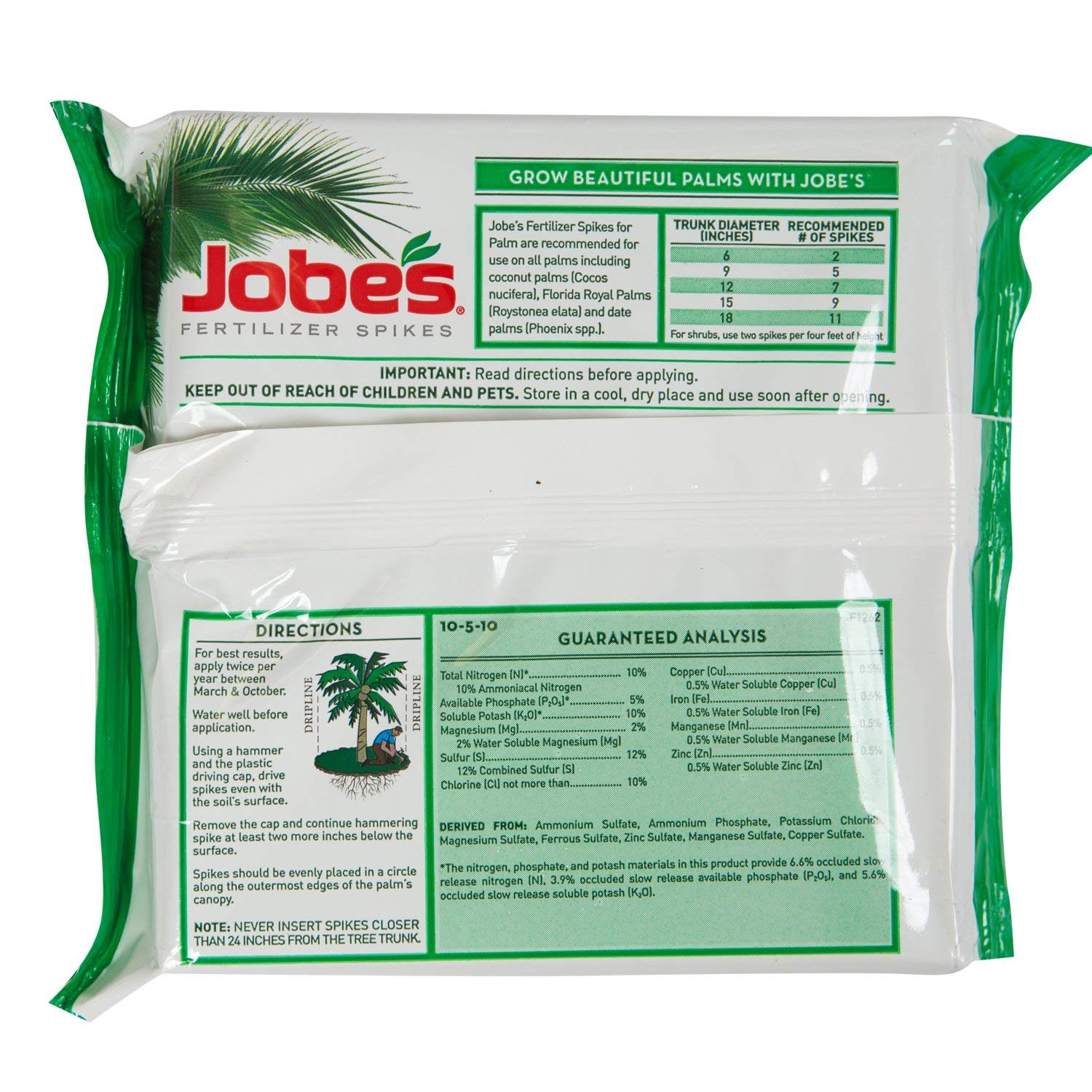 Jobe's Organics palm tree spikes inserted at soil level for slow release nourishment