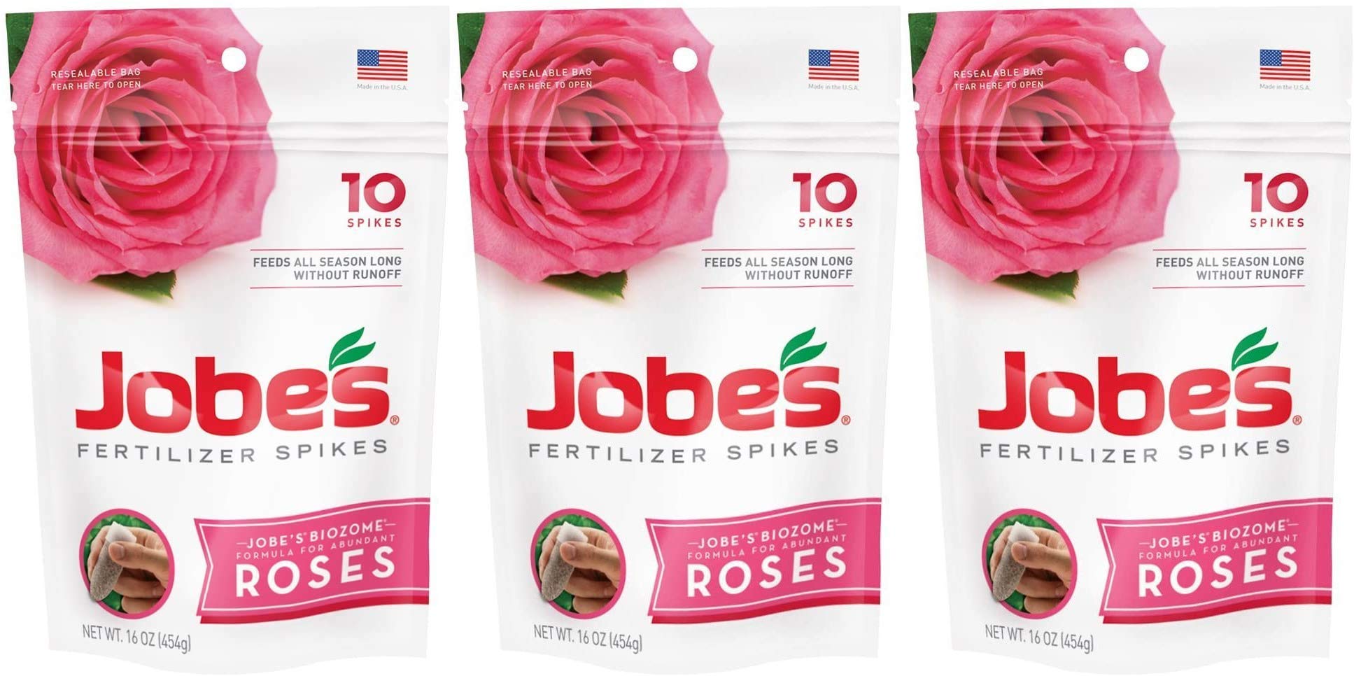Jobe's Organics Rose Fertilizer Spikes in soil around a rose plant.