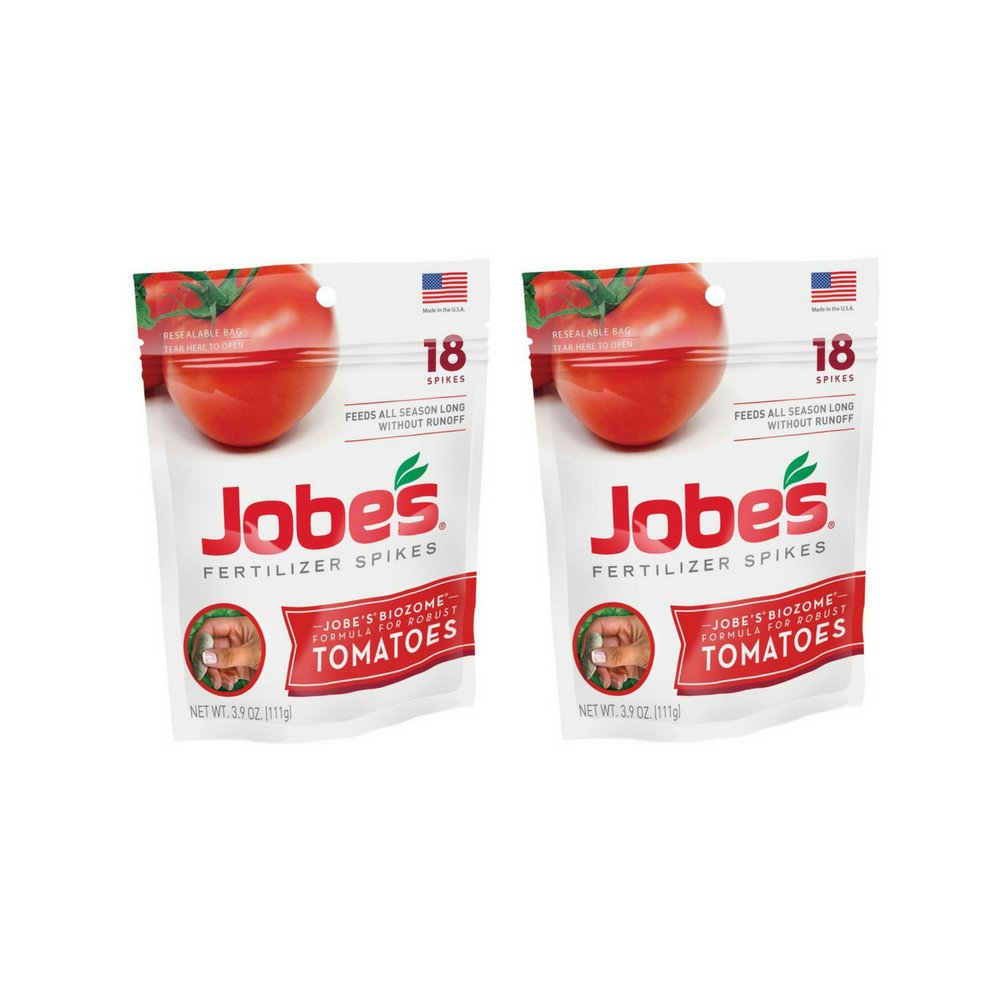 Jobe’s Organics tomato spikes beside a waterproof pouch for continuous soil feeding.