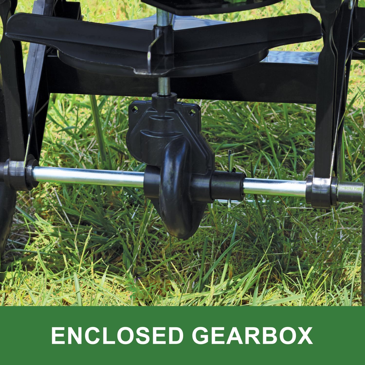 John Deere spreader enclosed gearbox protects gears from debris during spreading.