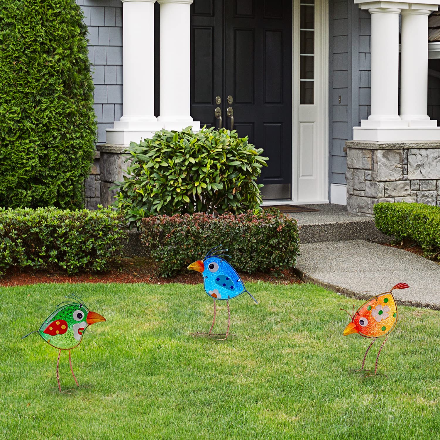 John's Studio outdoor metal birds brighten garden spaces year-round.