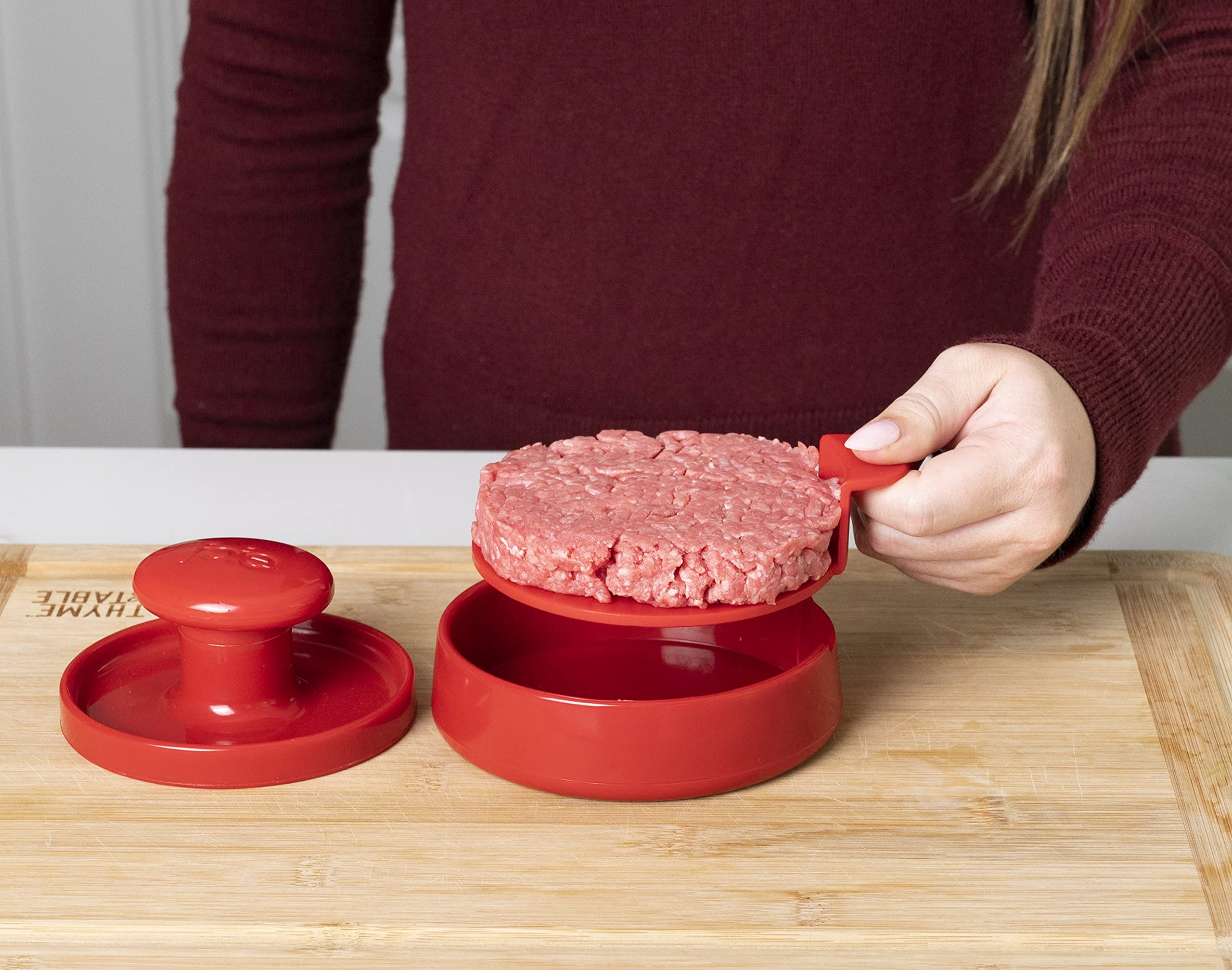 Joie burger press features detachable handle for easy cleaning and storage.