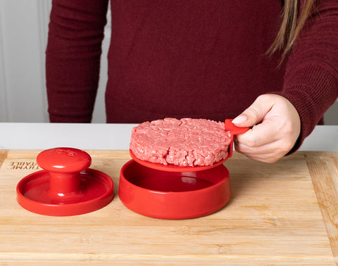 Joie burger press features detachable handle for easy cleaning and storage.