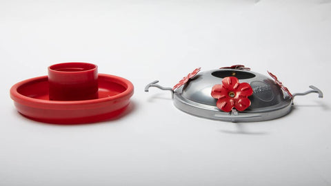 Four-pack replacement keeps multiple feeders ready with spare seals.