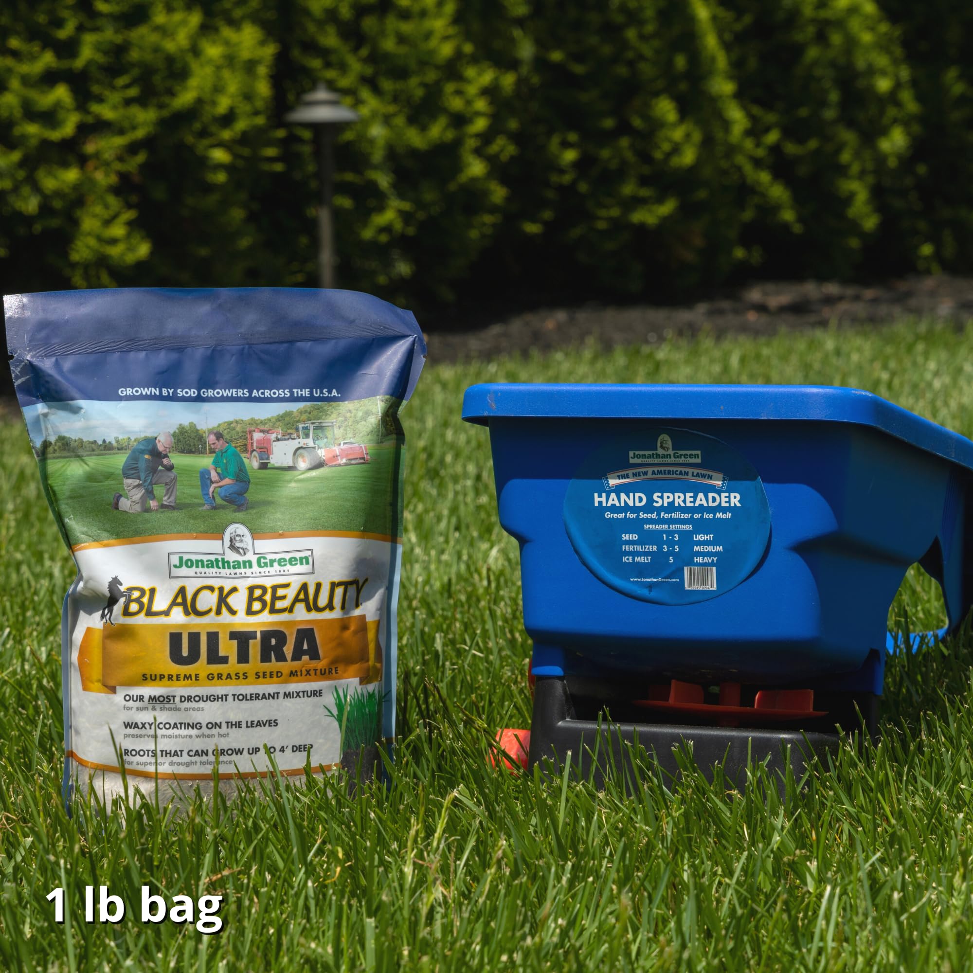 Jonathan Green handheld spreader features blue body and comfortable grip for easy use.