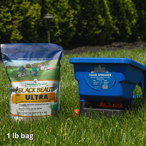 Jonathan Green handheld spreader features blue body and comfortable grip for easy use.