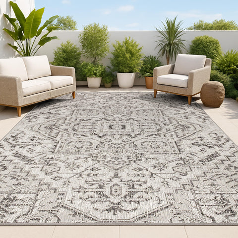 Jonathan Y boho medallion outdoor rug 8x10 in black and gray, durable for high-traffic patios.
