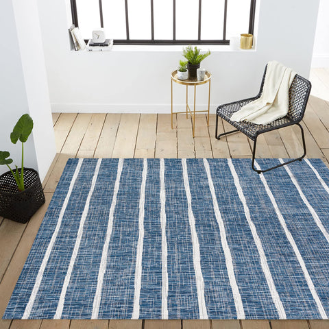 Jonathan Y Berber Stripe Rug blends coastal blue and ivory tones