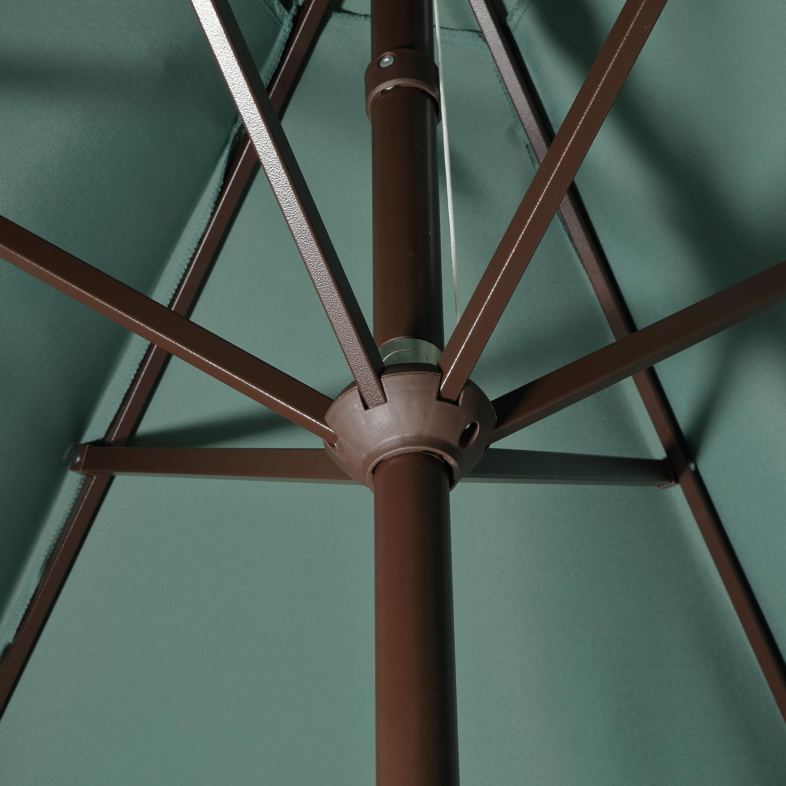 Jonathan Y Collins umbrella covers a dining table that seats six.