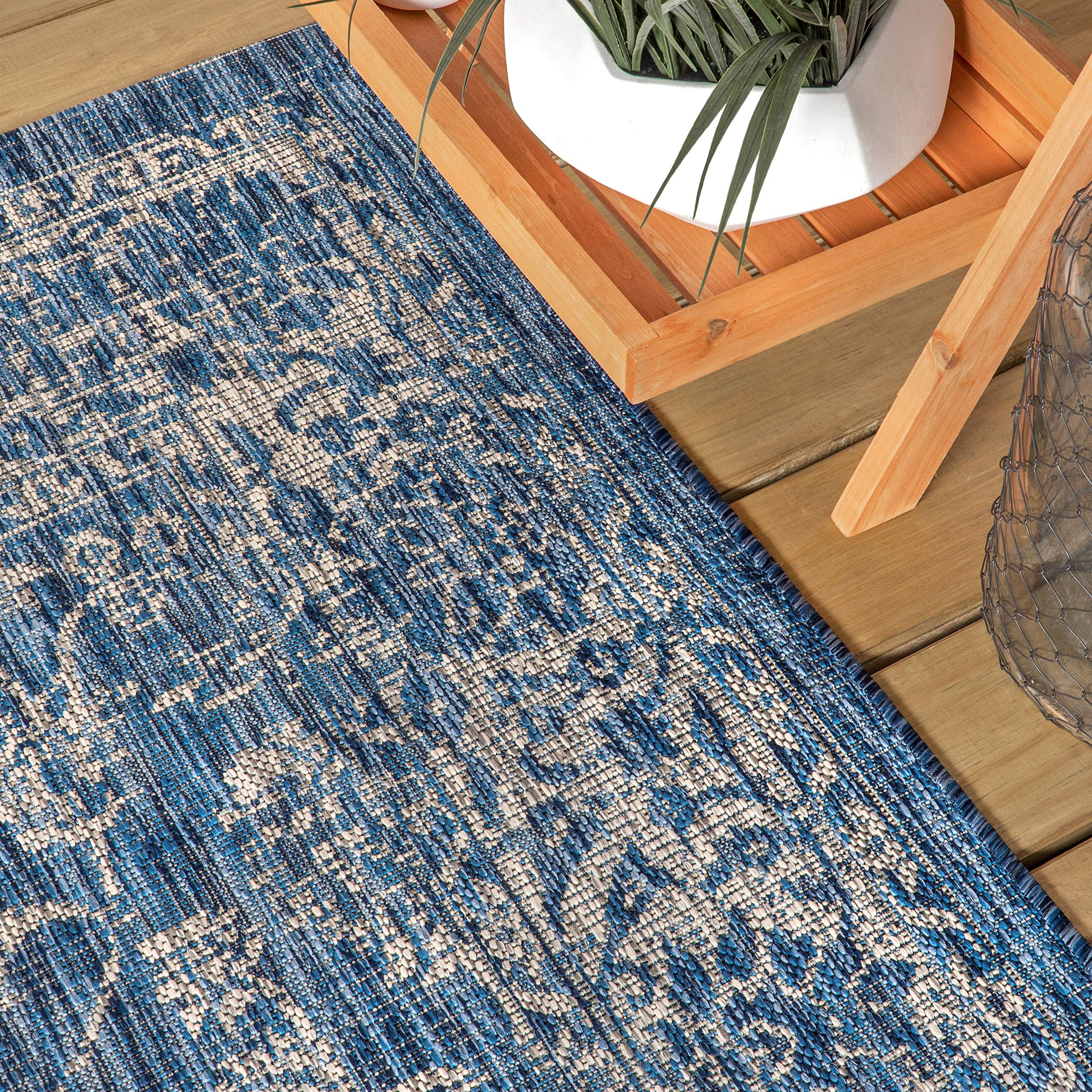 JONATHAN Y pet-friendly outdoor rug handles spills with simple cleaning.