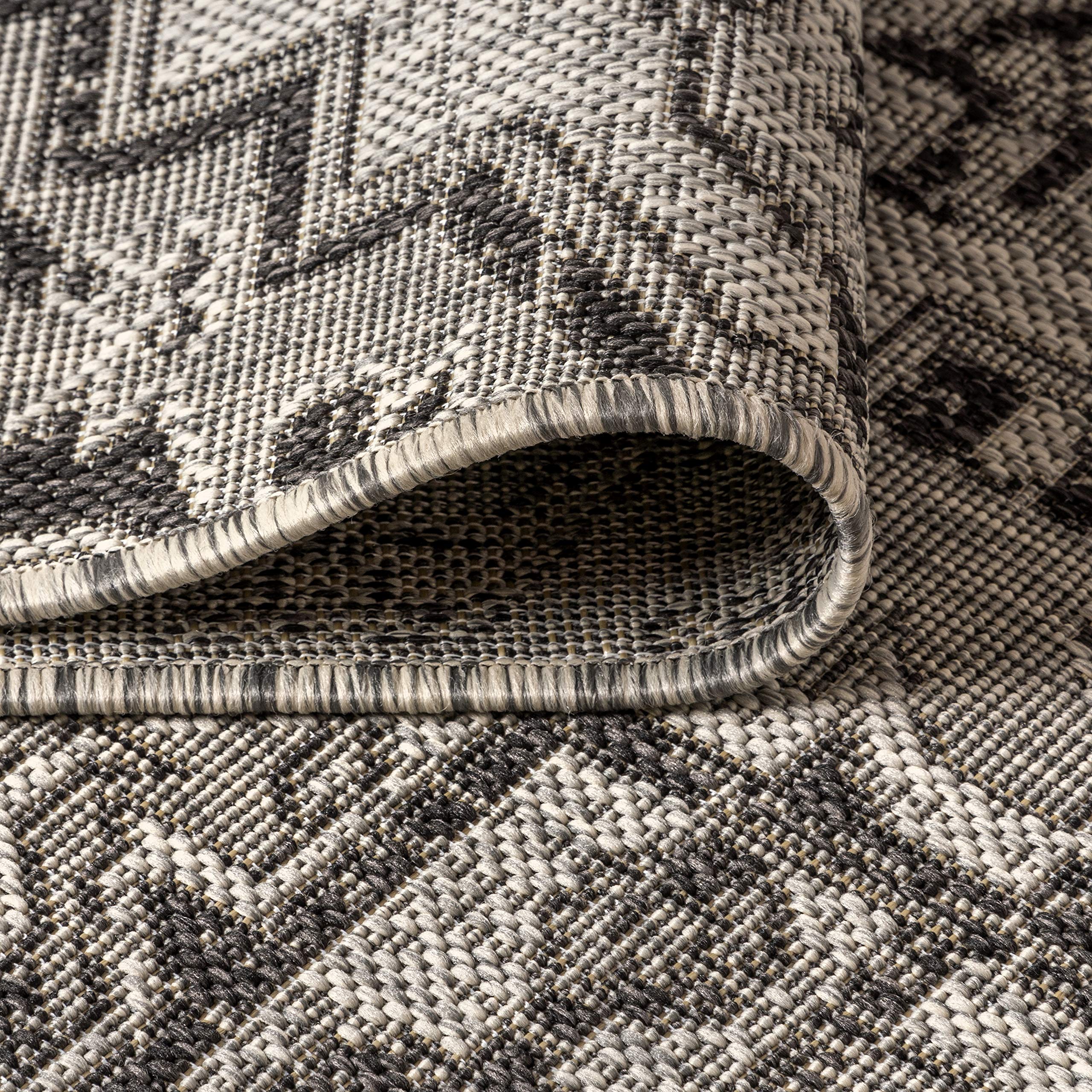 Jonathan Y easy-care rug cleans quickly with soap and water.