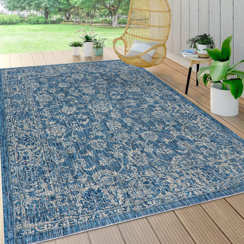 Jonathan Y flatweave polypropylene rug offering easy care and low-pile convenience.