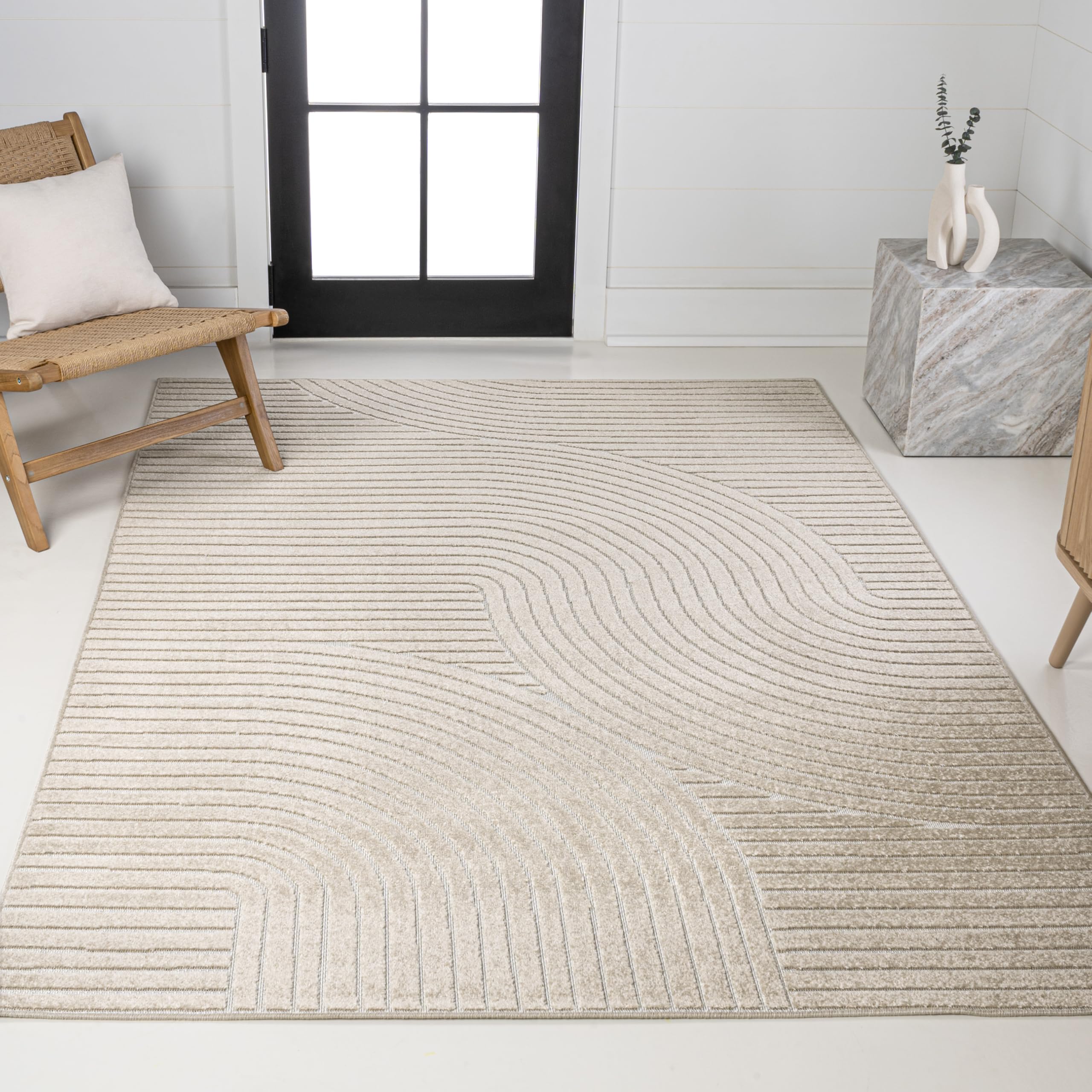 JONATHAN Y Hallie rug works outdoors, easy to hose down and maintain