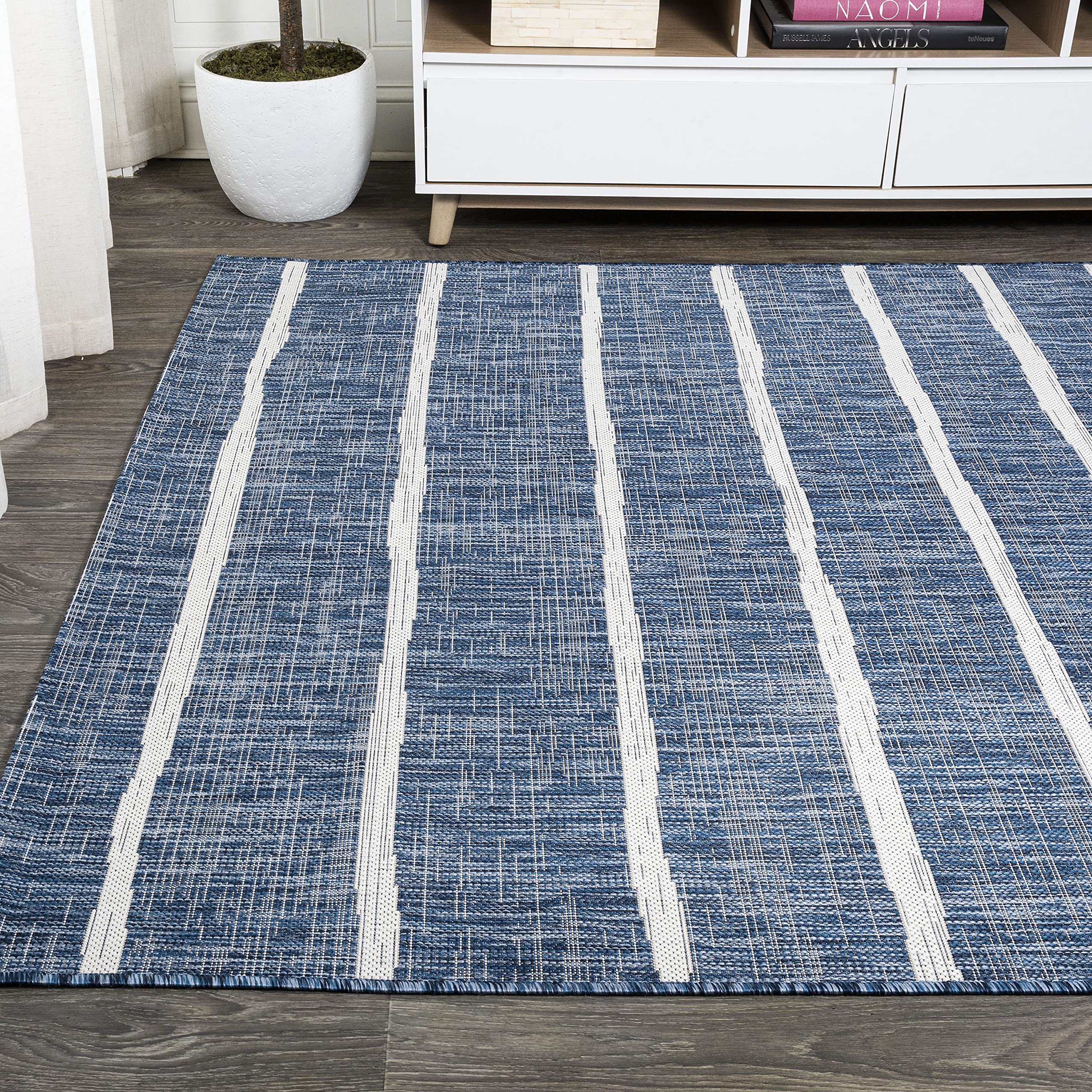 Jonathan Y Berber Stripe Rug fits living rooms, dining spaces, and bedrooms