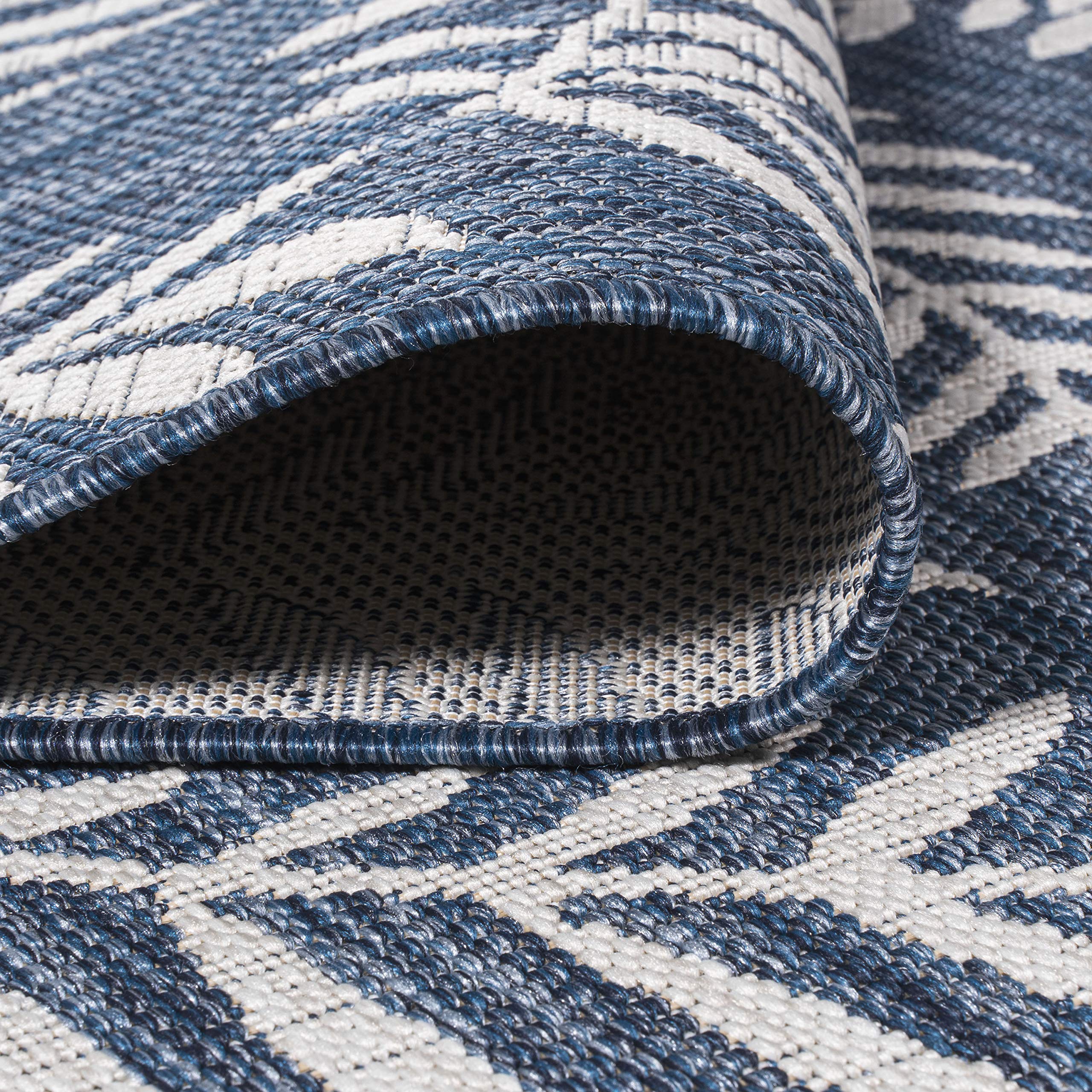 Jonathan Y easy-clean outdoor rug with simple rinse and quick dry.
