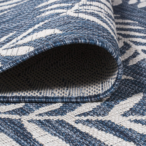 Jonathan Y easy-clean outdoor rug with simple rinse and quick dry.