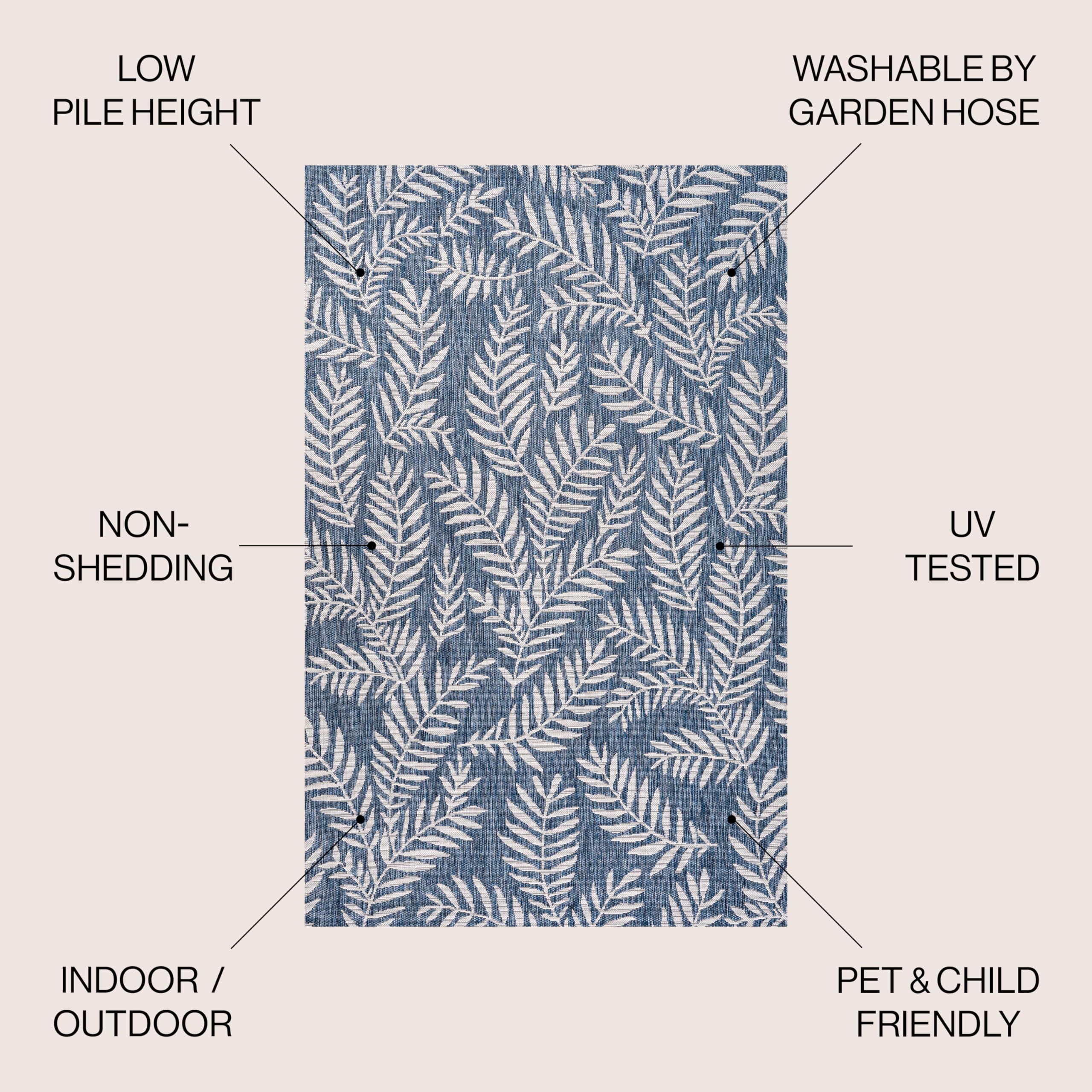 Jonathan Y Nevis indoor-outdoor rug supports high-traffic entryways with durability.