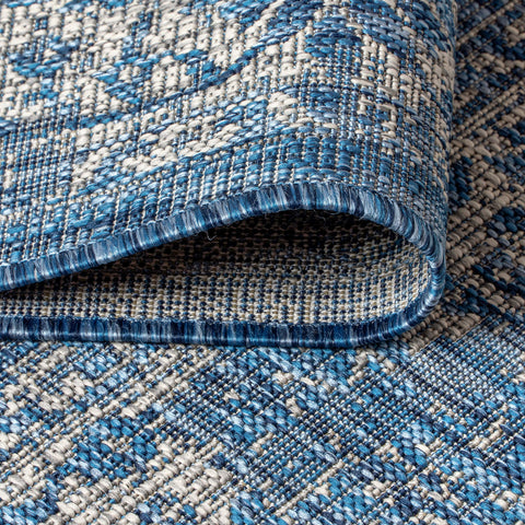 Jonathan Y stain-resistant pet-friendly rug cleans easily and resists fading.