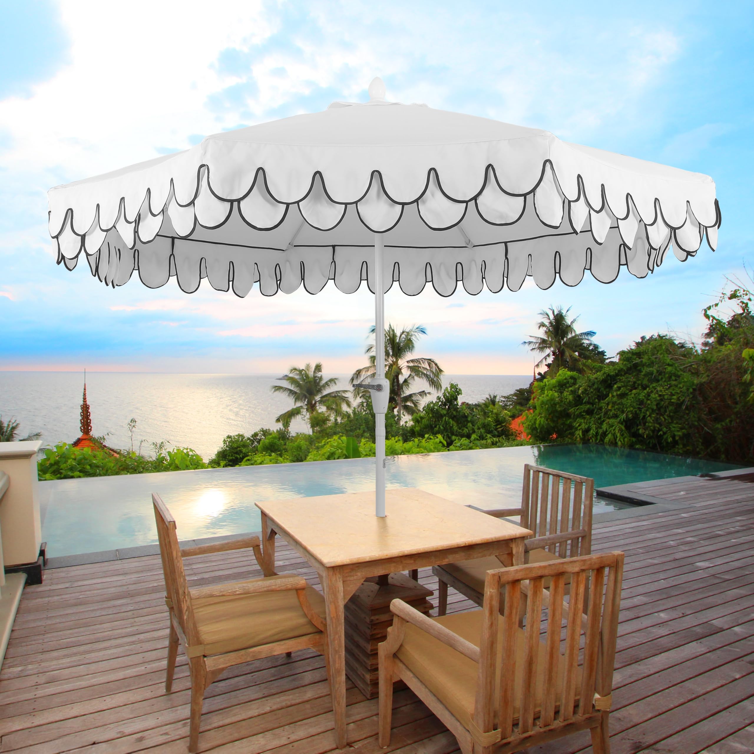 JONATHAN Y Tracy white canvas umbrella provides sun protection by the pool.