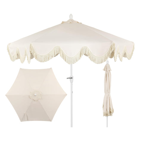 Jonathan Y UMB1001E cream umbrella with fringe edge adds cottage charm to outdoor spaces.