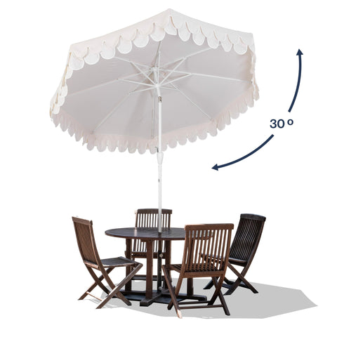 Jonathan Y Tracy dining setup under the umbrella for six seats