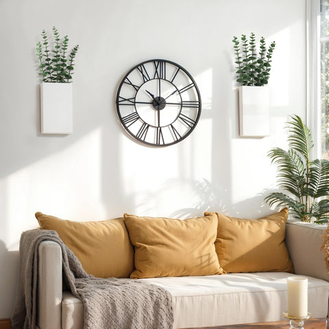 Josmimic black metal wall planter adds modern rustic charm.