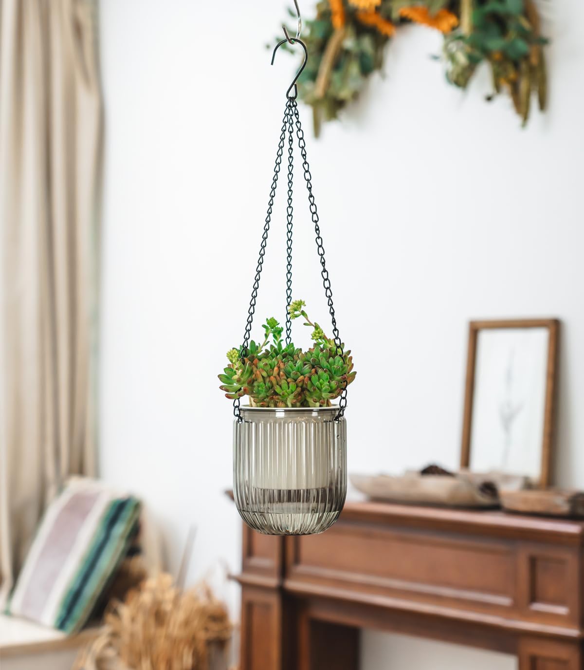 Josteve indoor-outdoor planter is versatile for hanging or tabletop display.