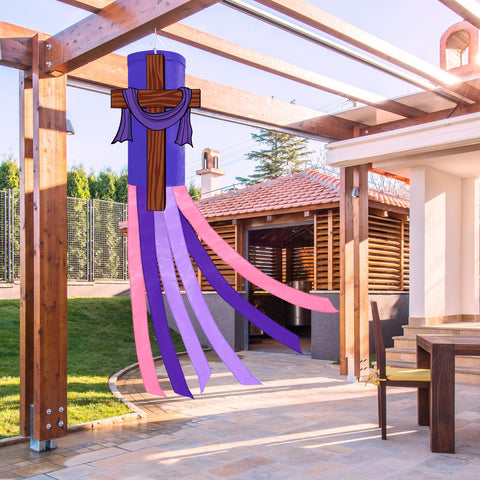 Jremreo windsock display welcoming garden or church spaces with cross accent.