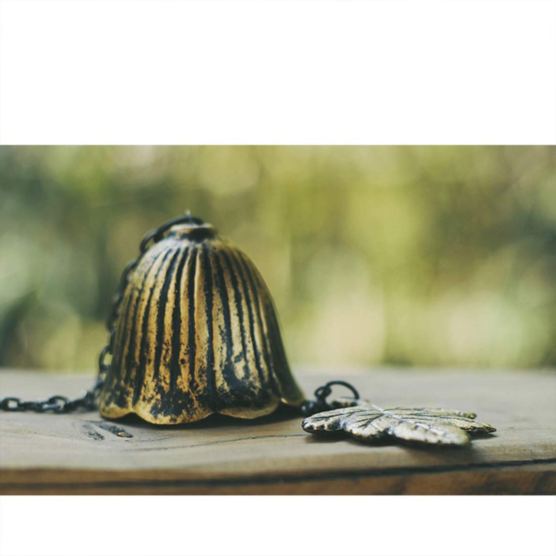 Jsacemxi windowsill chime captures breeze with soft, soothing tones.