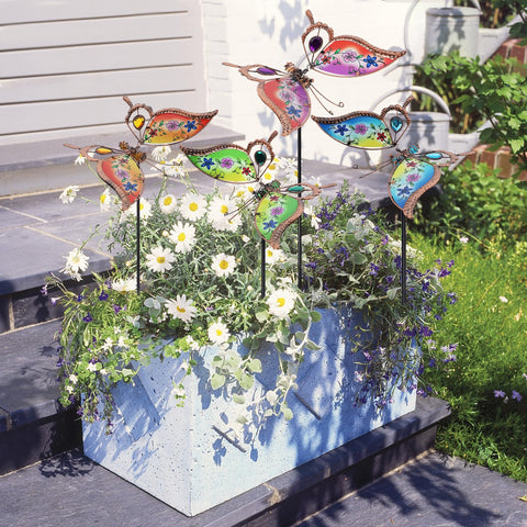 Juegoal metal butterfly stake with glass wings adds vibrant yard decor