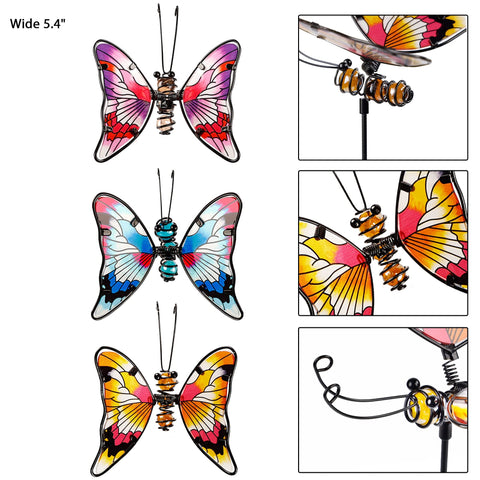 Wings quiver in breeze, creating a lifelike garden accent.