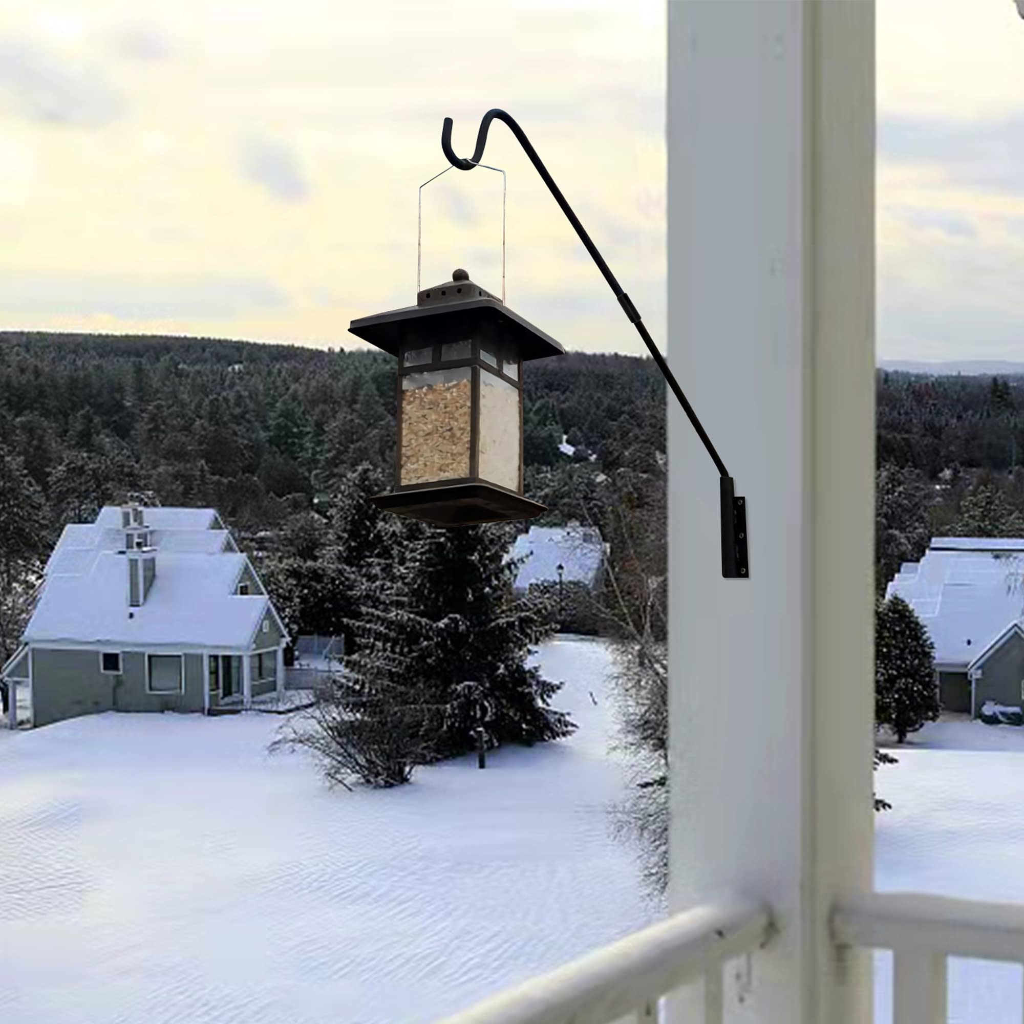 Juegoal lantern hung on deck hook for soft evening ambiance.