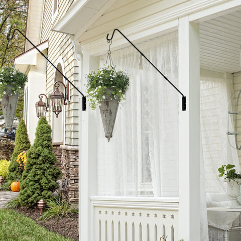 Juegoal shepherd hook in use, keeping feeders in sight on porch