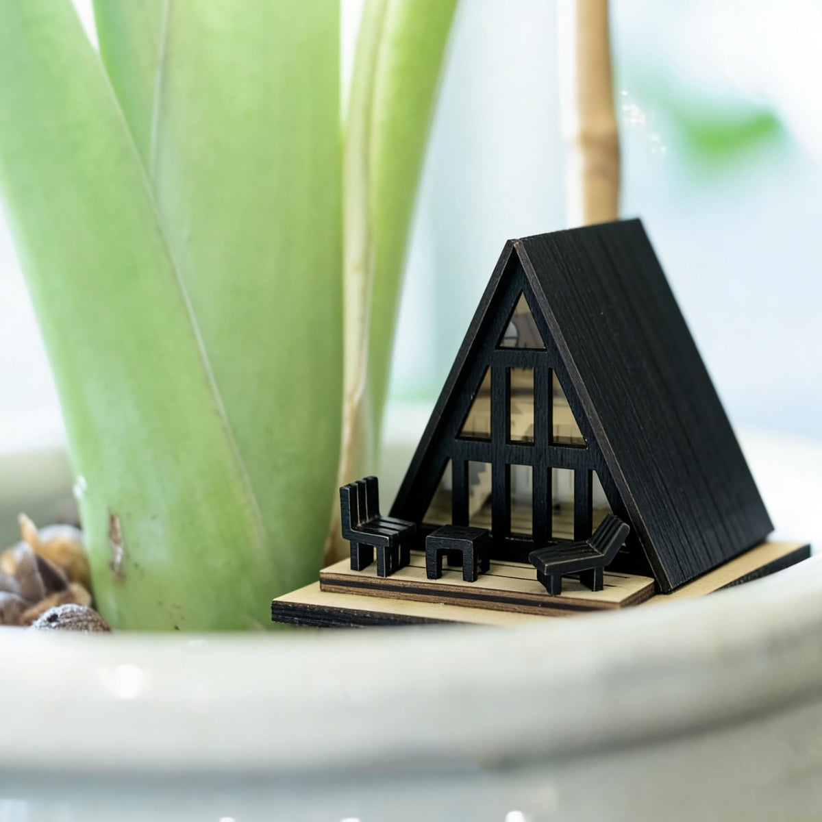 JULEASEL modern black A-frame cabin as a chic centerpiece for fairy gardens and desk decor.