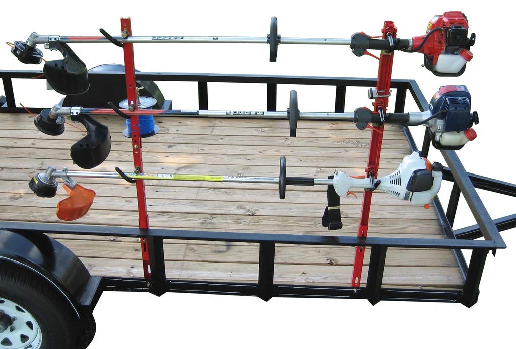 Jungle Jim's 3TR trimmer rack mounted on open trailer for easy access to tools