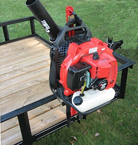 Jungle Jim's blower holder rack on trailer secures a backpack blower during transport
