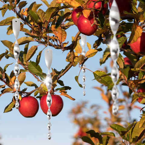JUNIQUTE Silver Bird Deterrent Rod Hanging enhances outdoor decor and protection.