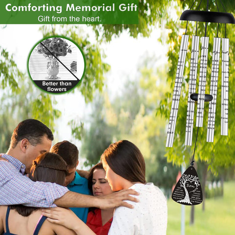 JUST FOR WIND wind chimes with engraved memory motif at dusk.