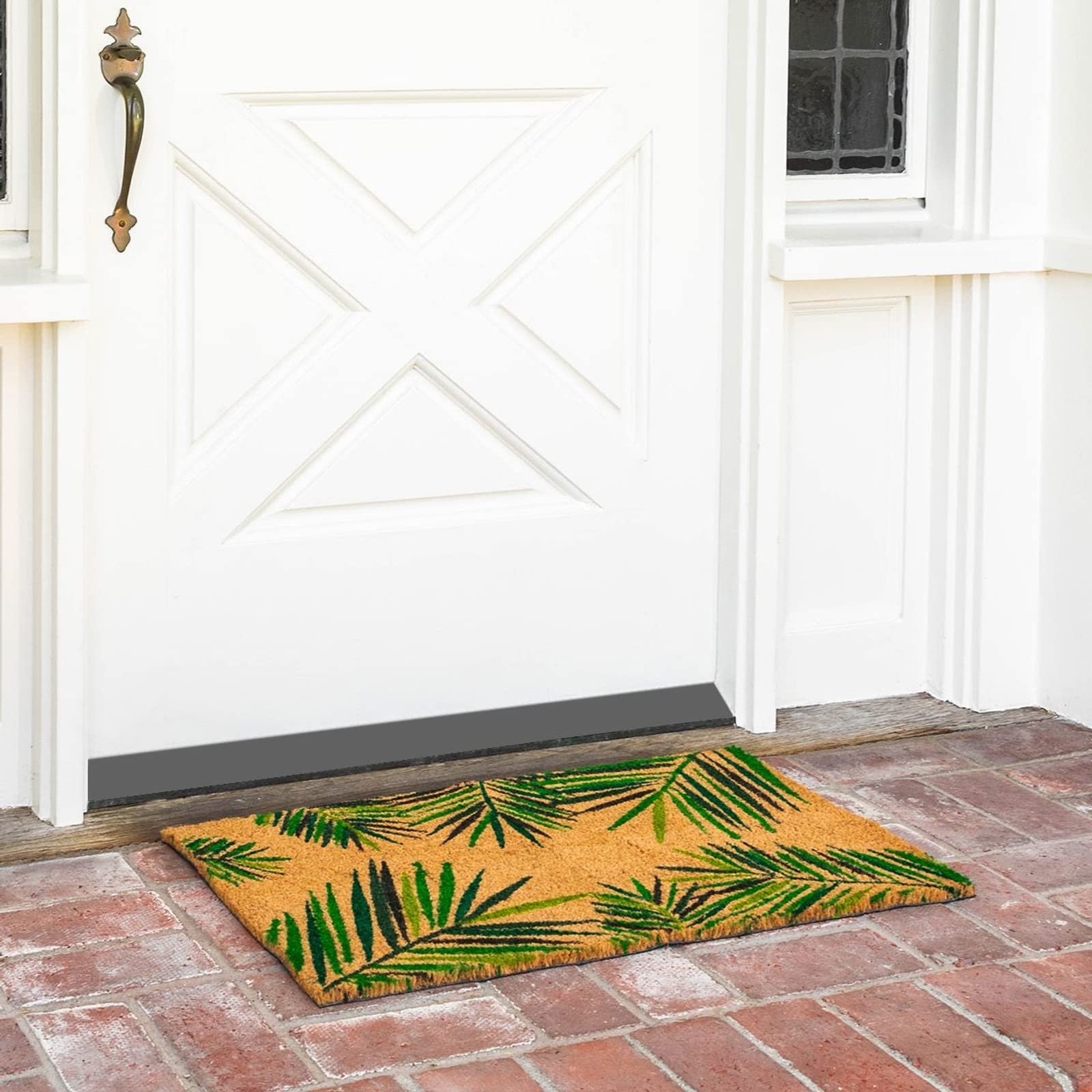 Juvale coir door mat with tropical leaf design protects floors and boosts curb appeal
