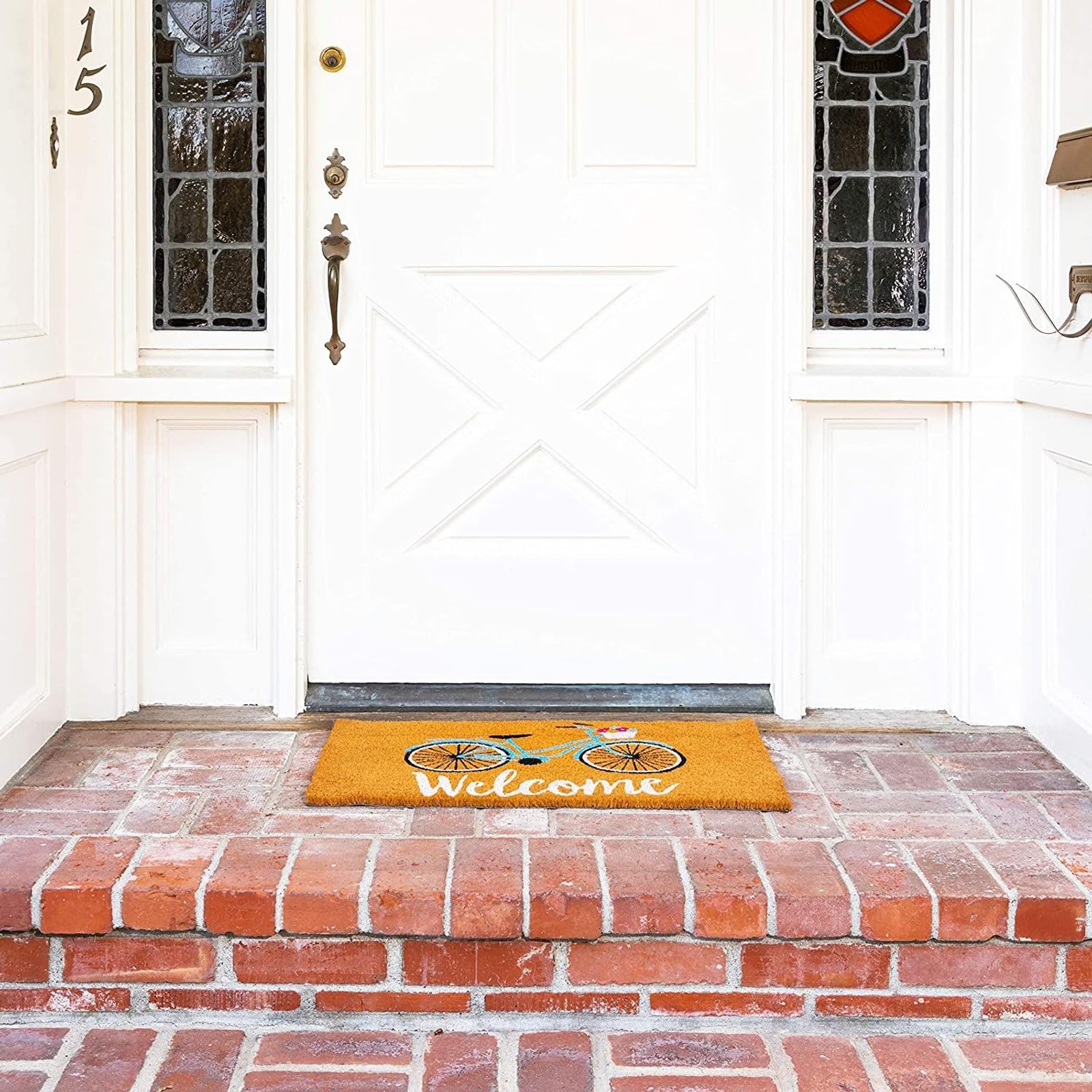 Juvale natural coir fiber mat traps dirt while showcasing a chic bike motif.