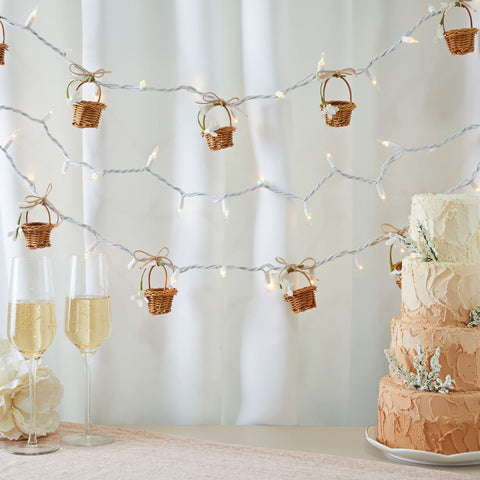 Juvale mini baskets used as wedding favor displays with small gifts.