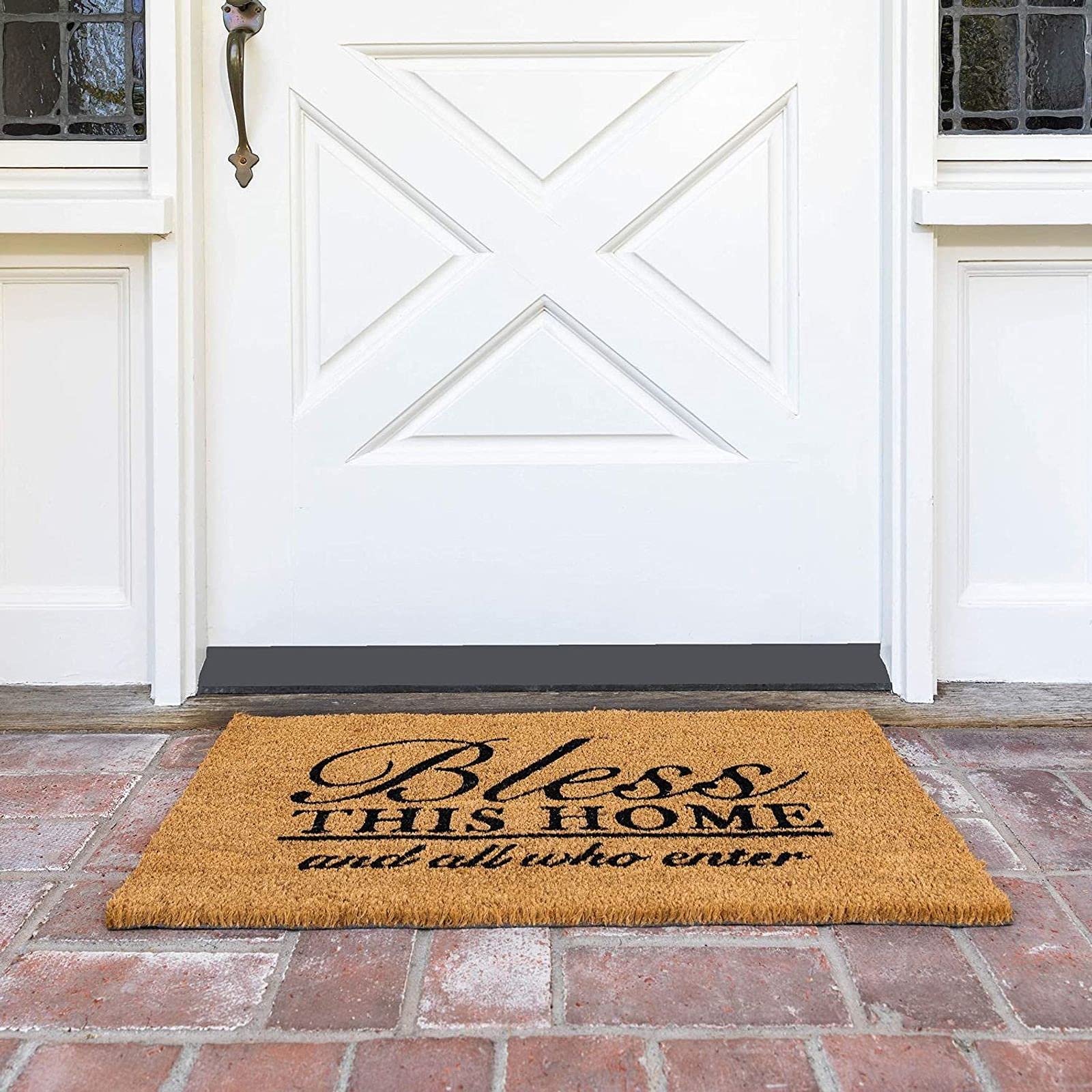 Brown natural finish of Juvale mat complements front porch decor.