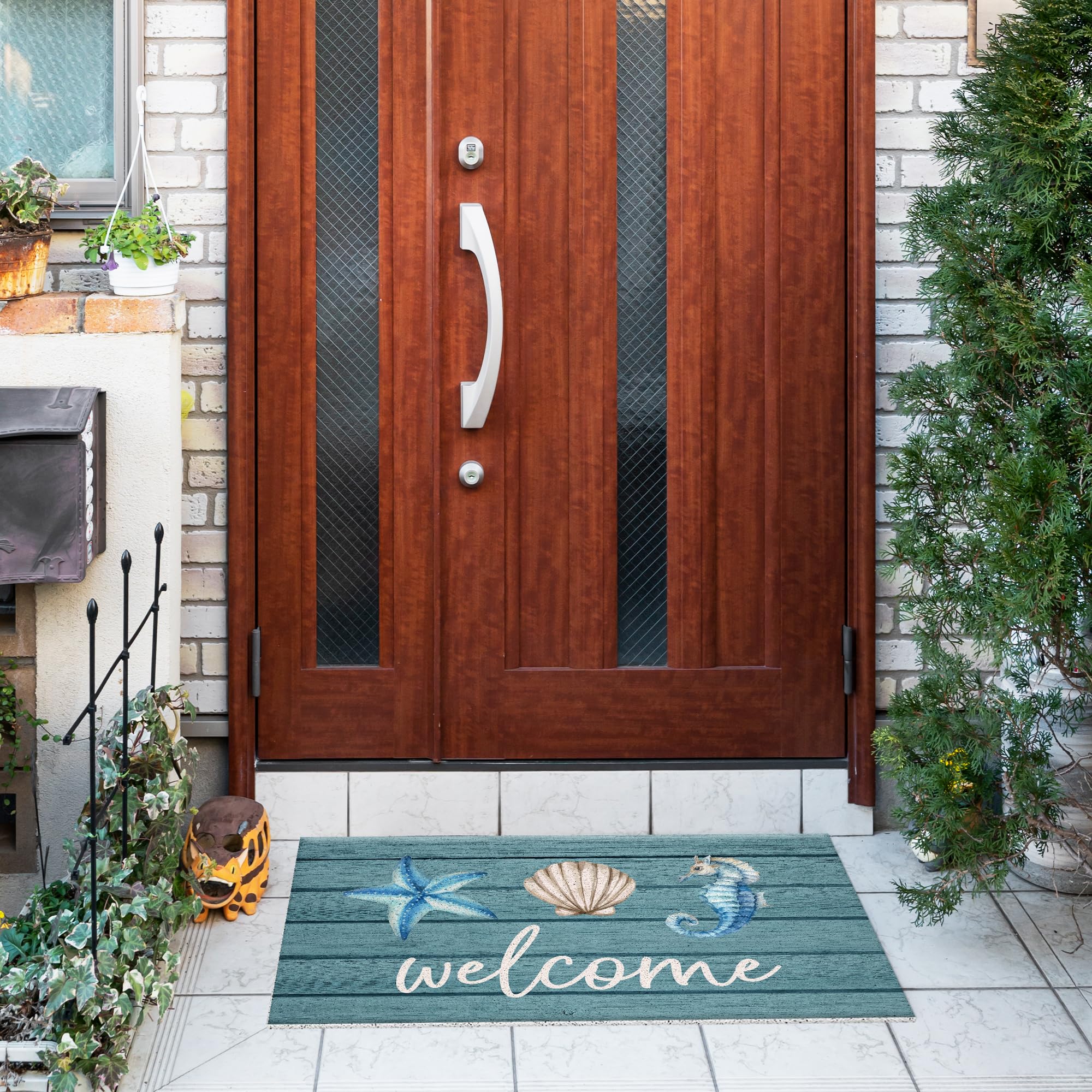 Jvpke Beach Welcome Mat starfish design adds seaside vibe and mud trapping at the entrance.