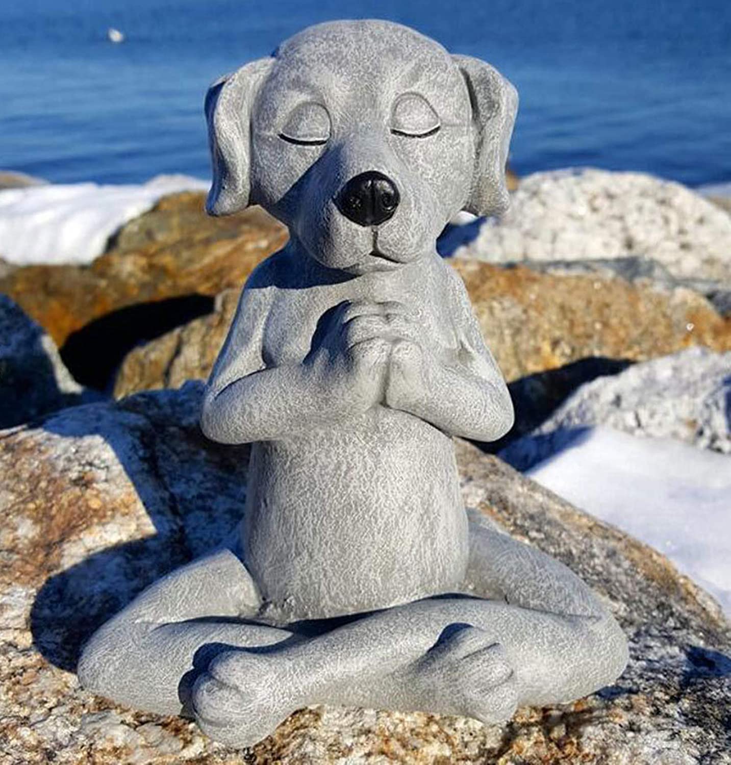 Jxueych Namaste dog figurine greets guests with tranquil charm