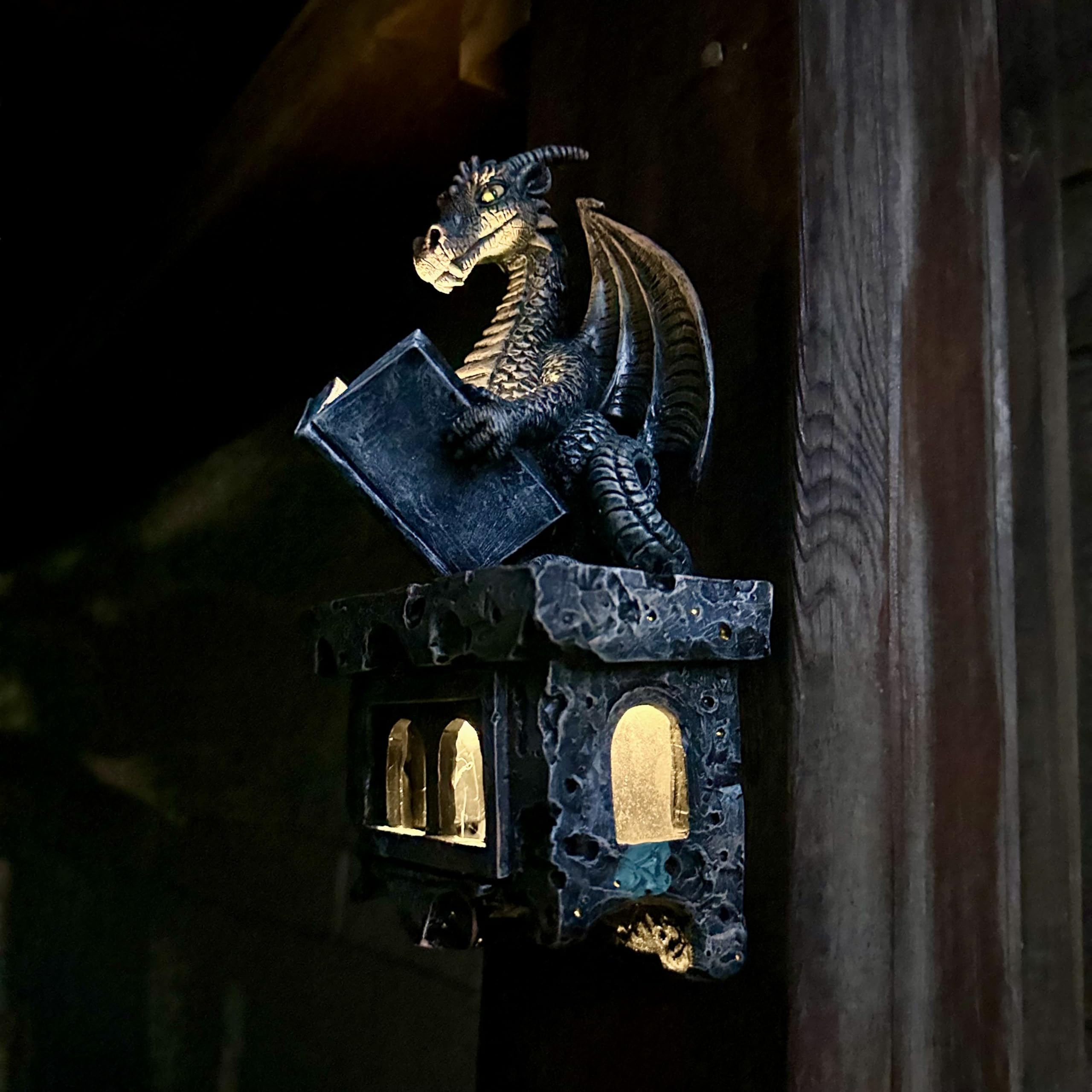 Jy.Cozy garden dragon statue on podium enhances outdoor decor.
