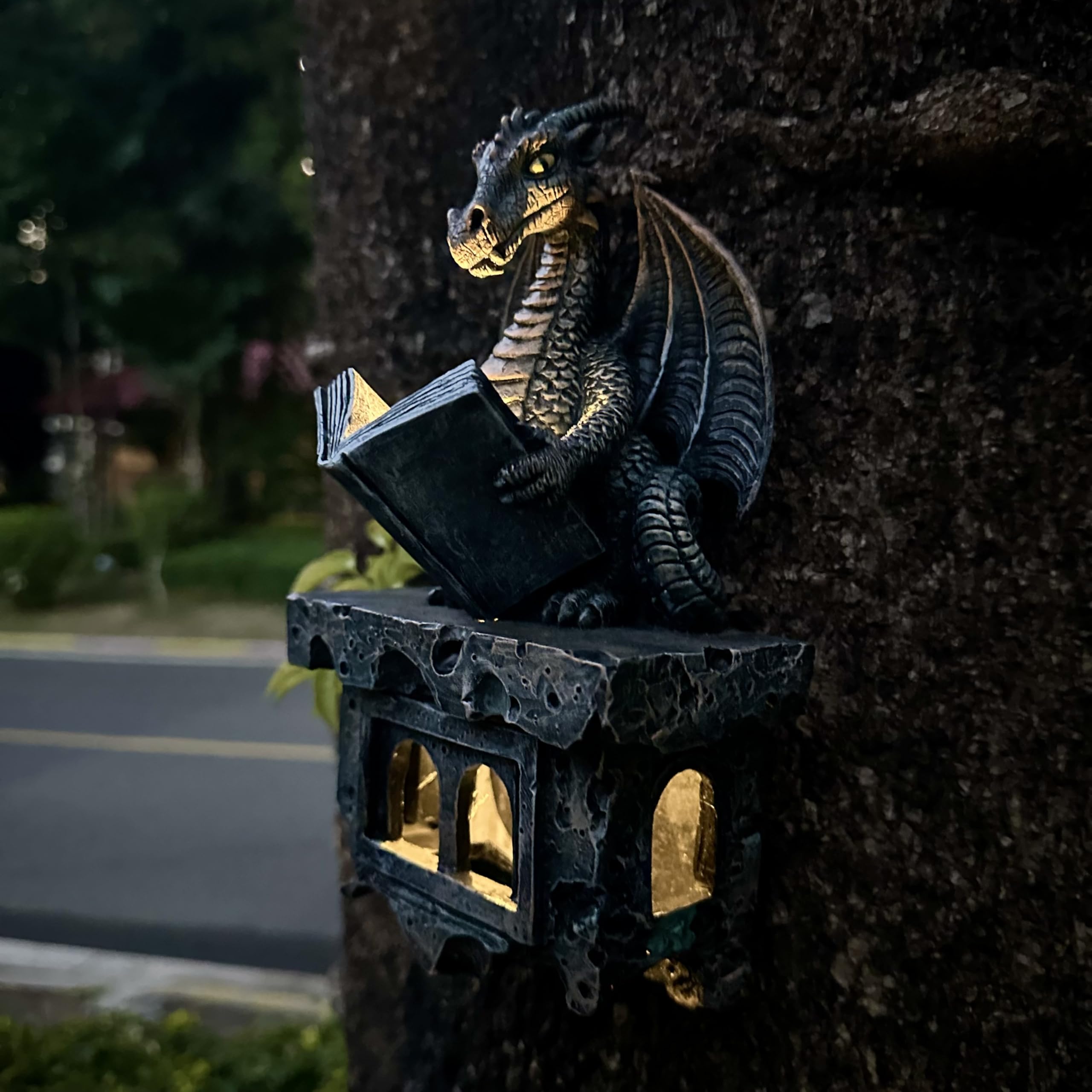 Solar panel powers the dragon's book illumination at night.