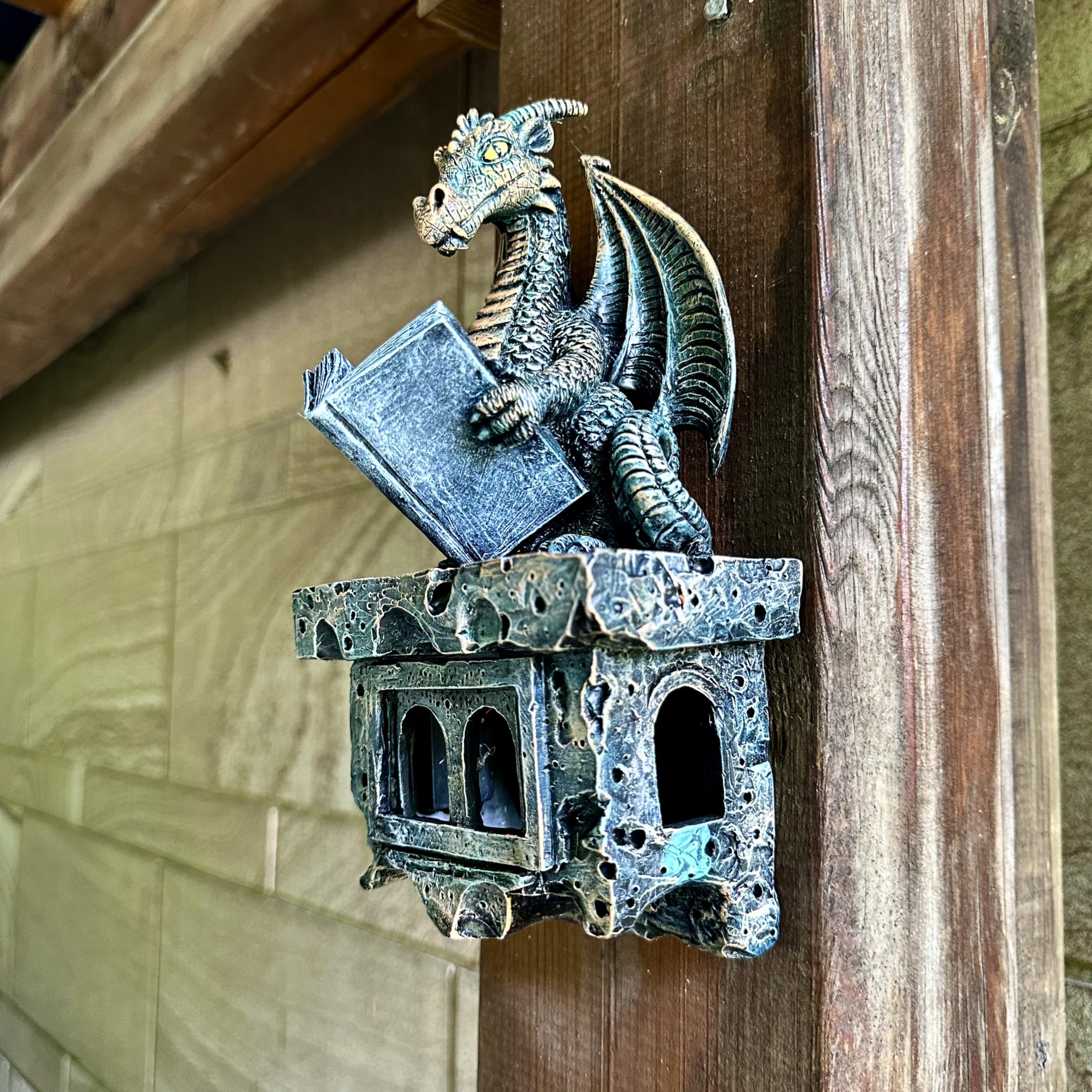 Wall-mounted dragon figurine with dual reinforced hanging slots.